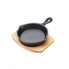small cast iron round fry pan with wooden serving board, for serving hot food