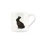 a celestial, space inspired white fine china mug with stars, planets, constellations and a large black bunny rabbit