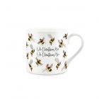 Funny fine china Christmas mug with flying bees wearing hats, scarves and booties
