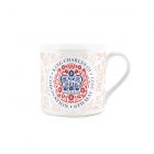 a white & red King Charles the Third commemorative mug with the official emblem