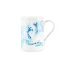 A white small mug with blue jellyfish
