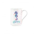 A white fine china mug with a vibrant water colour seahorse