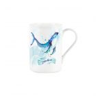 A white mug with a painted blue whale