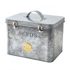 a silver galvanised steel seed storage tin, with metal clasps and carry handle and brass Sophie Conran seal