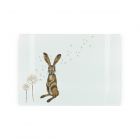 small textured glass chopping board with hare and dandelion print