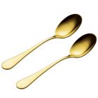 Set of gold coloured serving spoons