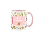 pink and white ceramic mug with pretty gardening prints and head gardener text