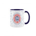 a white and navy blue ceramic mug with the offical King Charles coronation emblem