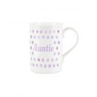 a purple polka dot bone china mug with text reading 'Auntie'