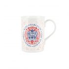 a red and white fine bone china mug to commemorate the coronation of king Charles the third