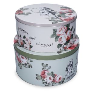 Set of 2 round cake tins with Alice in wonderland and pink floral illustrations.