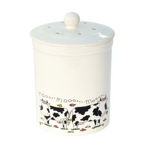 Ceramic compost caddy with cow illustration print around the base