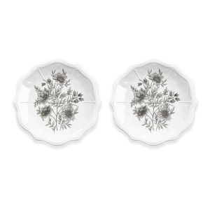 a set of two white melamine side plates with a black floral design