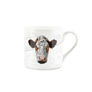 Fine china mug printed with a farm background and a cow face in the foreground