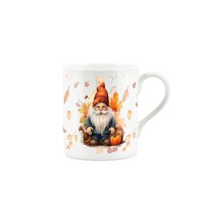 Mug featuring gnome surrounded by pumpkins on a leafy autumnal background. 
