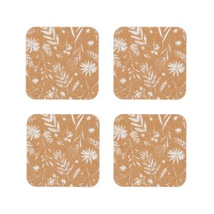 Set of four natural cork coasters featuring a white flowers print design.
