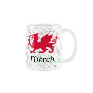 White ceramic mug with a red welsh dragon,splattered red and green background and merch (daughter) text