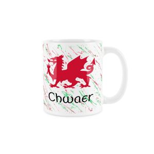 White ceramic mug with a red welsh dragon,splattered red and green background and chwaer (sister) text