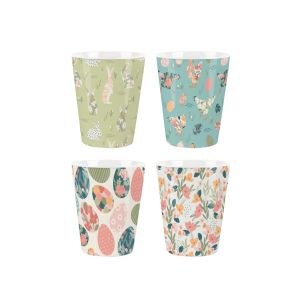 Mixed set of four ceramic egg cups, each featuring different Easter themed prints including Easter eggs, chickens, flowers and bunnies.
