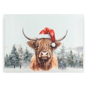 large glass worktop protector with a festive Highland Cow design wearing a Santa hat