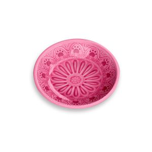 pink plastic cat saucer with a paw print design