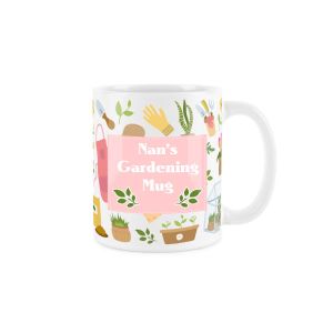 a white and pink ceramic mug with a gardening inspired design, and text reading 'Nan's Gardening Mug'