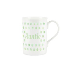 a white bone china mug with a green polka dot print, and the word 'Auntie'