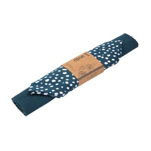 Ink blue coloured placemat and napkin, featuring a white polka dot pattern. Made from cotton and recycled cotton.